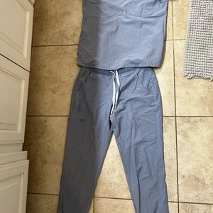 Figs light blue/grey. Worn once maybe twice